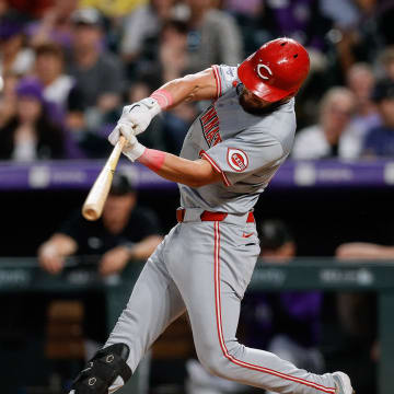 Jun 3, 2024; Denver, Colorado, USA; Cincinnati Reds designated hitter Nick Martini (23) hits a double in the sixth inning against the Colorado Rockies at Coors Field. Mandatory Credit: Isaiah J. Downing-USA TODAY Sports