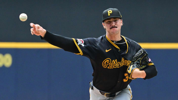 Jul 11, 2024; Milwaukee, Wisconsin, USA; Pittsburgh Pirates starting pitcher Paul Skenes (30) pitches in the first inning against the Milwaukee Brewers at American Family Field. Mandatory Credit: Benny Sieu-USA TODAY Sports