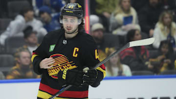 Nov 23, 2025; Vancouver, British Columbia, CAN;  Vancouver Canucks defenseman Quinn Hughes (43) skates between play during the second period against the Calgary Flames at Rogers Arena. Mandatory Credit: Simon Fearn-Imagn Images