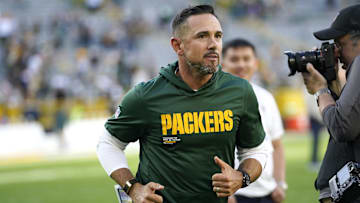 Aug 23, 2025; Green Bay, Wisconsin, USA; Green Bay Packers Head Coach Matt LaFleur runs off the field following a 20-7 win against the Seattle Seahawks at Lambeau Field. Mandatory Credit: Kayla Wolf-Imagn Images