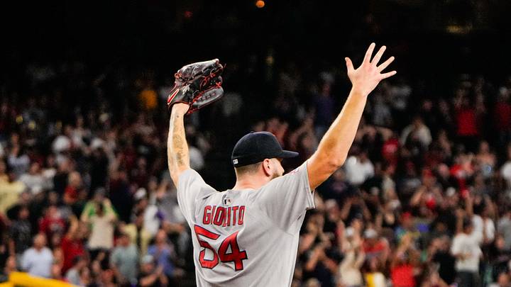 Sep 6, 2025; Phoenix, Arizona, USA; Boston Red Sox pitcher Lucas Giolito (54) celebrates after Boston Red Sox outfielder Ceddanne Rafaela (3) robs a home run during the fifth inning against the Arizona Diamondbacks at Chase Field. Mandatory Credit: Arianna Grainey-Imagn Images