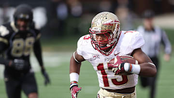 FSU's Jalen Ramsey returns a fumble, one of seven Wake Forest turnovers, for a touchdown Nov. 9, 2013. The FSU Seminoles played like the No. 2 team in the nation by throttling the Wake Forest Demon Deacons, 59-3 Nov. 9, 2013.

131109 A