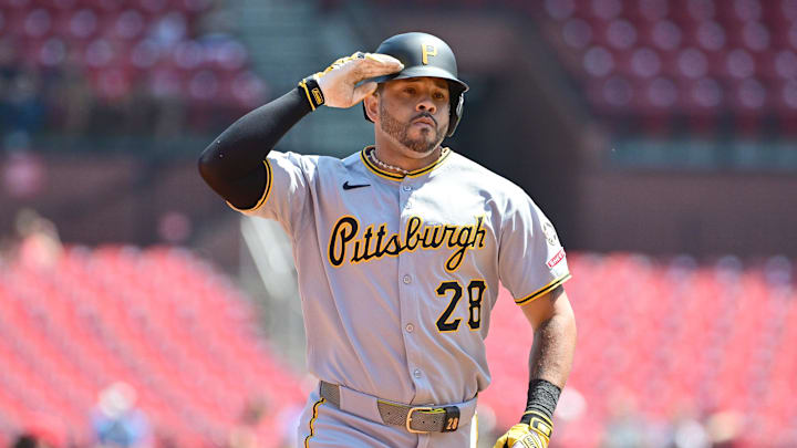 Aug 28, 2025; St. Louis, Missouri, USA;  Pittsburgh Pirates left fielder Tommy Pham (28) salutes teammates in the dugout after hitting a solo home run against the St. Louis Cardinals during the first inning at Busch Stadium. Mandatory Credit: Tim Vizer-Imagn Images