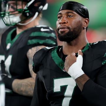 Oct 31, 2024; East Rutherford, New Jersey, USA; New York Jets defensive end Haason Reddick (7) on the sidelines during the first quarter against the Houston Texans at MetLife Stadium. Mandatory Credit: Brad Penner-Imagn Images