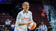 Fever guard Sophie Cunningham exited Sunday's win against the Sun in the second quarter after suffering a knee injury.