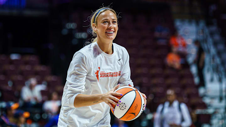 Fever guard Sophie Cunningham exited Sunday's win against the Sun in the second quarter after suffering a knee injury.