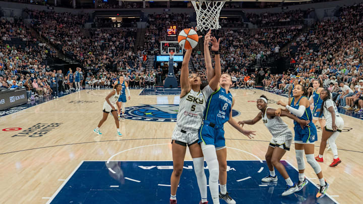 Jul 6, 2025; Minneapolis, Minnesota, USA; Chicago Sky forward Angel Reese (5) and Minnesota Lynx forward Alanna Smith (8) go up for a rebound in the third quarter at Target Center. Jul 6, 2025; Minneapolis, Minnesota, USA; Chicago Sky forward Angel Reese (5) and Minnesota Lynx forward Alanna Smith (8) go up for a rebound in the third quarter at Target Center.