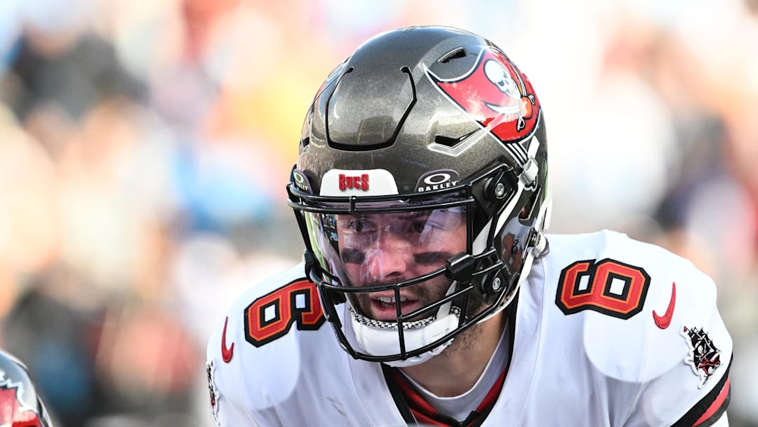 Dec 21, 2025; Charlotte, North Carolina, USA; Tampa Bay Buccaneers quarterback Baker Mayfield (6) at the line of scrimmage in the third quarter at Bank of America Stadium. Mandatory Credit: Bob Donnan-Imagn Images