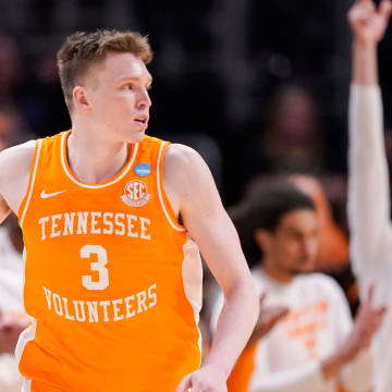 Tennessee Volunteers guard Dalton Knecht (3) holds up three fingers to celebrate a three-point basket Sunday, March 31, 2024, during the midwest regional championship at the Little Caesars Arena in Detroit. The Purdue Boilermakers defeated the Tennessee Volunteers, 72-66.