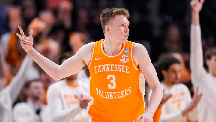 Tennessee Volunteers guard Dalton Knecht (3) holds up three fingers to celebrate a three-point basket Sunday, March 31, 2024, during the midwest regional championship at the Little Caesars Arena in Detroit. The Purdue Boilermakers defeated the Tennessee Volunteers, 72-66.