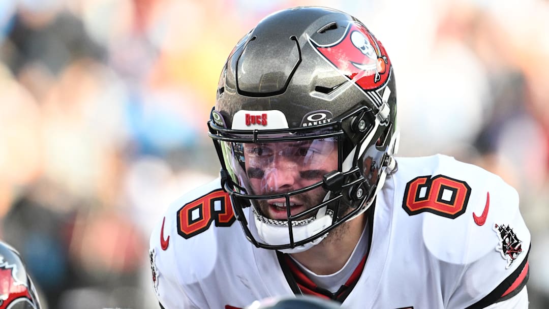 Dec 21, 2025; Charlotte, North Carolina, USA; Tampa Bay Buccaneers quarterback Baker Mayfield (6) at the line of scrimmage in the third quarter at Bank of America Stadium. Mandatory Credit: Bob Donnan-Imagn Images