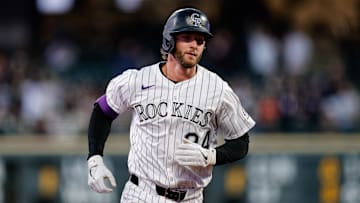 Apr 9, 2025; Denver, Colorado, USA; Colorado Rockies third baseman Ryan McMahon (24) rounds the bases on a solo home run in the third inning against the Milwaukee Brewers at Coors Field. Mandatory Credit: Isaiah J. Downing-Imagn Images