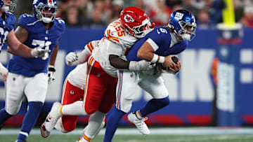 Sep 21, 2025; East Rutherford, New Jersey, USA; New York Giants quarterback Jaxson Dart (6) runs against Kansas City Chiefs defensive tackle Omarr Norman-Lott (55) in the third quarter at MetLife Stadium. Mandatory Credit: Vincent Carchietta-Imagn Images