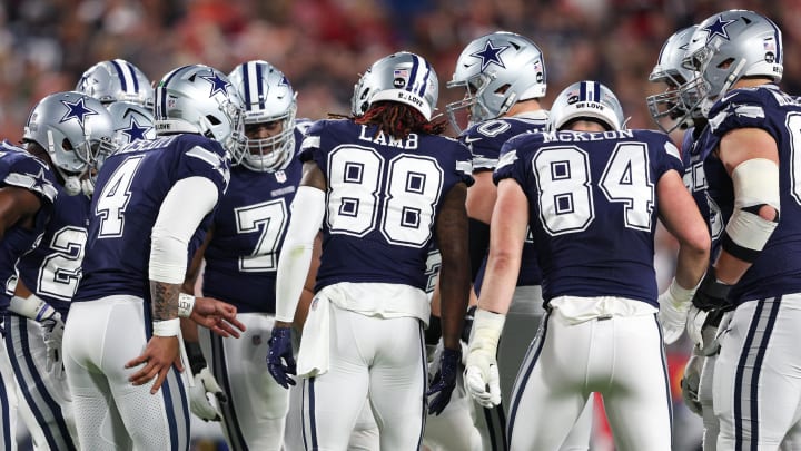 Jan 16, 2023; Tampa, Florida, USA; Dallas Cowboys quarterback Dak Prescott (4) leads a huddle against the Tampa Bay Buccaneers in the first quarter during a wild card game at Raymond James Stadium. 