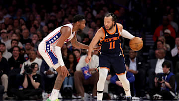 Feb 26, 2025; New York, New York, USA; New York Knicks guard Jalen Brunson (11) controls the ball against Philadelphia 76ers forward Justin Edwards (19) during the fourth quarter at Madison Square Garden. Mandatory Credit: Brad Penner-Imagn Images