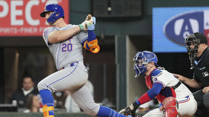 Jun 17, 2024; Arlington, Texas, USA; New York Mets first baseman Pete Alonso (20) follows through on his RBI single against the Texas Rangers during the second inning at Globe Life Field. Mandatory Credit: Jim Cowsert-USA TODAY Sports