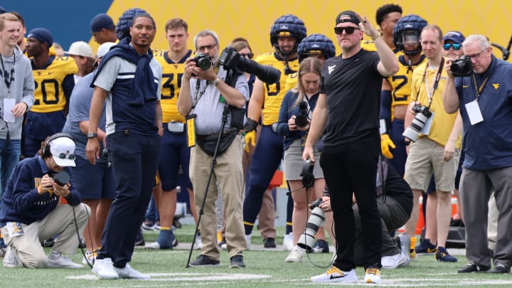 West Virginia University football legends Pat White and Pat McAfee