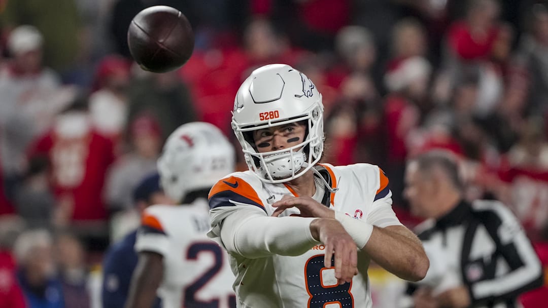 Dec 25, 2025; Kansas City, Missouri, USA; Denver Broncos quarterback Jarrett Stidham (8) warms up before the game at GEHA Field at Arrowhead Stadium. Mandatory Credit: Denny Medley-Imagn Images