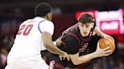 Feb 1, 2025; Dallas, Texas, USA;  Stanford Cardinal forward Maxime Raynaud (42) looks to score as Southern Methodist Mustangs forward Jerrell Colbert (20) defends during the second half at Moody Coliseum. Mandatory Credit: Kevin Jairaj-Imagn Images