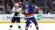 Dec 10, 2024; Elmont, New York, USA; New York Islanders left wing Anders Lee (27) celebrates his goal against Los Angeles Kings defenseman Vladislav Gavrikov (84) during the second period at UBS Arena. Mandatory Credit: Brad Penner-Imagn Images