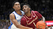 Mar 1, 2025; Durham, North Carolina, USA;  Florida State Seminoles guard Jamir Watkins (1) breaks around Duke Blue Devils guard Caleb Foster (1) during the first half at Cameron Indoor Stadium. Mandatory Credit: Zachary Taft-Imagn Images