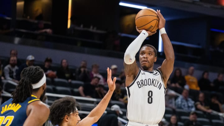 Apr 1, 2024; Indianapolis, Indiana, USA; Brooklyn Nets guard Lonnie Walker IV (8) shoots the ball while Indiana Pacers guard Kendall Brown (10) defends in the second half at Gainbridge Fieldhouse. Mandatory Credit: Trevor Ruszkowski-USA TODAY Sports