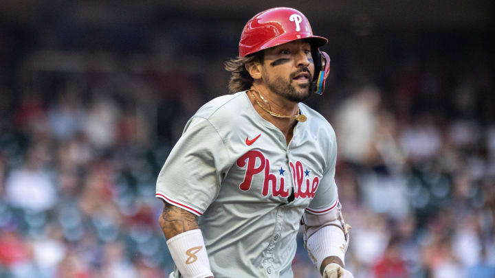 Aug 22, 2024; Cumberland, Georgia, USA; Philadelphia Phillies outfielder Nick Castellanos (8) runs to first base after hitting a ground ball against Atlanta Braves during the first inning at Truist Park. Mandatory Credit: Jordan Godfree-USA TODAY Sports