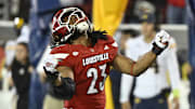 Nov 8, 2025; Louisville, Kentucky, USA;  Louisville Cardinals defensive lineman Wesley Bailey (23) reacts after sacking California Golden Bears quarterback Jaron-Keawe Sagapolutele (3) during the second half at L&N Federal Credit Union Stadium. California defeated Louisville 29-26. Mandatory Credit: Jamie Rhodes-Imagn Images