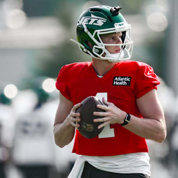 Jul 25, 2025; Florham Park, NJ, USA; New York Jets quarterback Brady Cook (4) participates in a drill during training camp at Atlantic Health Jets Training Center. Mandatory Credit: John Jones-Imagn Images