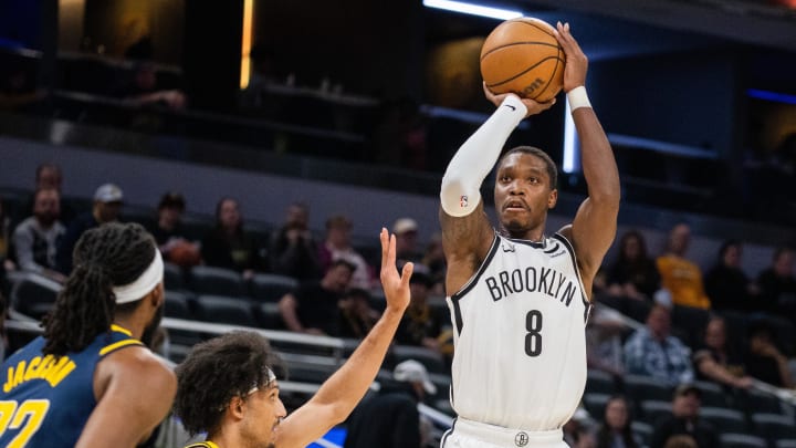 Apr 1, 2024; Indianapolis, Indiana, USA; Brooklyn Nets guard Lonnie Walker IV (8) shoots the ball while Indiana Pacers guard Kendall Brown (10) defends in the second half at Gainbridge Fieldhouse. Mandatory Credit: Trevor Ruszkowski-USA TODAY Sports