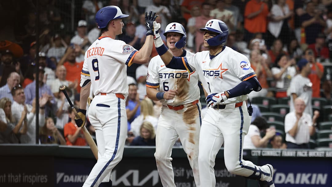 Apr 11, 2025; Houston, Texas, USA;  Houston Astros first baseman Zach Dezenzo (9) center fielder Jake Meyers (6) celebrates right fielder Cam Smith (11) two run home run against the Los Angeles Angels in the eighth inning at Daikin Park. 