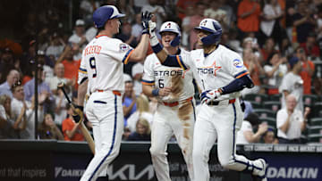 Apr 11, 2025; Houston, Texas, USA;  Houston Astros first baseman Zach Dezenzo (9) center fielder Jake Meyers (6) celebrates right fielder Cam Smith (11) two run home run against the Los Angeles Angels in the eighth inning at Daikin Park. 