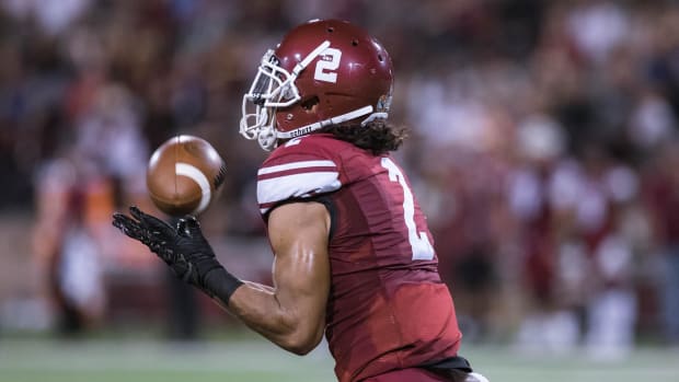 Isaiah Garcia-Castaneda (2) receives the ball with the New Mexico State Aggies.