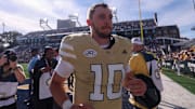 Oct 25, 2025; Atlanta, Georgia, USA; Georgia Tech Yellow Jackets quarterback Haynes King (10) celebrates after a victory over the Syracuse Orange at Bobby Dodd Stadium at Hyundai Field. Mandatory Credit: Brett Davis-Imagn Images