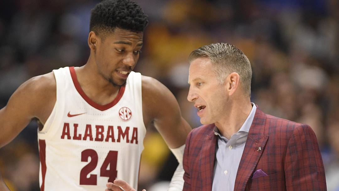 Mar 11, 2023; Nashville, TN, USA;  Alabama Crimson Tide head coach Nate Oats talks with forward Brandon Miller (24) against the Missouri Tigers during the second half at Bridgestone Arena. Mandatory Credit: Steve Roberts-Imagn Images