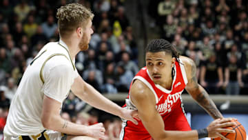 Purdue Boilermakers forward Caleb Furst (1) defends Ohio State Buckeyes forward Devin Royal (21) Tuesday, Jan. 21, 2025, during the NCAA men’s basketball game at Mackey Arena in West Lafayette, Ind.