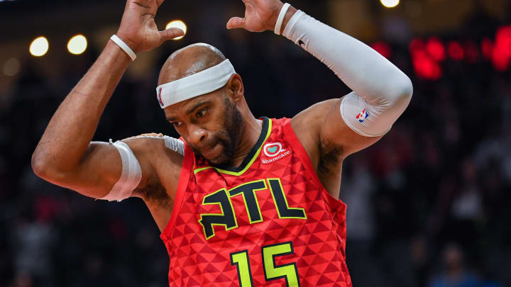 Nov 21, 2018; Atlanta, GA, USA; Atlanta Hawks forward Vince Carter (15) reacts after scoring his 25,000 point in the NBA on a dunk on the final play of the game during the second half at State Farm Arena. Mandatory Credit: Dale Zanine-USA TODAY Sports