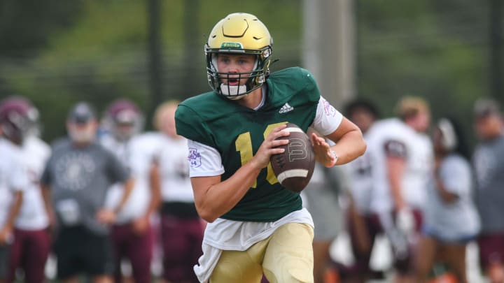 Catholic's Mack Bartholomew (10) runs with the ball at a football scrimmage between Bearden and Catholic High School at Blaine Stadium on Friday, August 2, 2024.