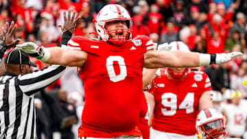 Nov 11, 2023; Lincoln, Nebraska, USA; Nebraska Cornhuskers defensive lineman Nash Hutmacher (0) celebrates after getting a stop on fourth down against the Maryland Terrapins during the third quarter at Memorial Stadium. Mandatory Credit: Dylan Widger-Imagn Images