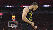 Golden State Warriors guard Stephen Curry reacts after a play during Game 7 of their first-round playoff series against the Houston Rockets at Toyota Center in Houston on May 4, 2025.