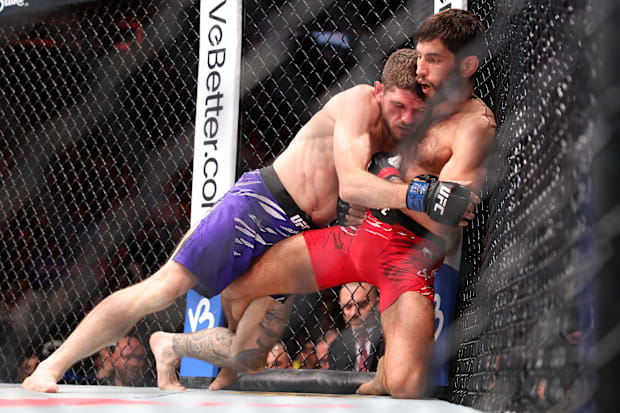 Matt fast (red gloves) fights against Jimmy Flick (blue gloves) during the UFC fight night in the T-Mobile Center. 