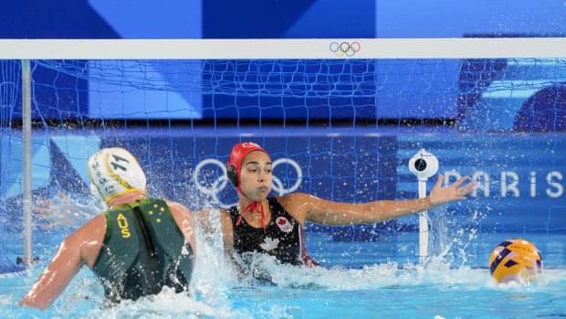 Former Indiana athlete Jessica Gaudreault competes as a goalie for Canada in water polo.