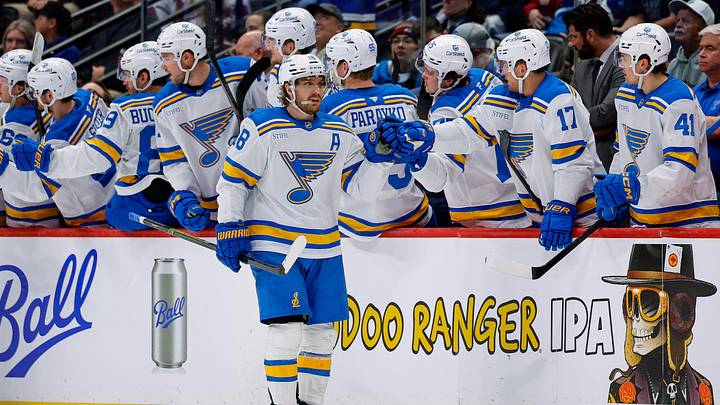 Apr 5, 2026; Denver, Colorado, USA; St. Louis Blues center Robert Thomas (18) celebrates with the bench after his goal in the second period against the Colorado Avalanche at Ball Arena. Mandatory Credit: Isaiah J. Downing-Imagn Images