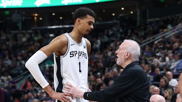 Mar 27, 2024; Salt Lake City, Utah, USA; San Antonio Spurs center Victor Wembanyama (1) and head coach Gregg Popovich speak d