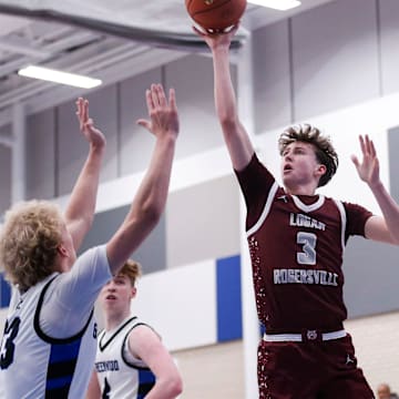 Logan-Rogersville guard Chase Branham attempts a floater