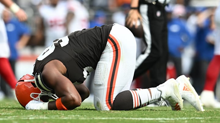 Sep 22, 2024; Cleveland, Ohio, USA; Cleveland Browns defensive end Myles Garrett (95) lies on the ground after being injured during the second half against the New York Giants at Huntington Bank Field. Mandatory Credit: Ken Blaze-Imagn Images