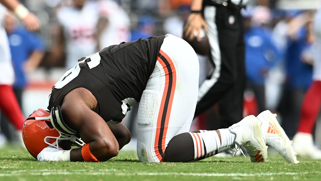 Cleveland Browns defensive end Myles Garrett (95) lies on the ground after being injured during the second half against the New York Giants at Huntington Bank Field.