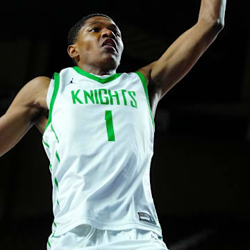St. Mary’s forward Cameron Williams (1) dunks 