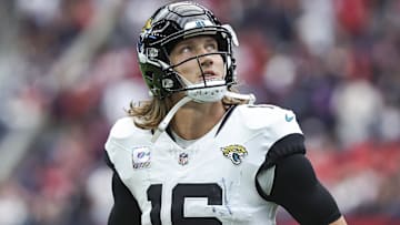 Sep 29, 2024; Houston, Texas, USA; Jacksonville Jaguars quarterback Trevor Lawrence (16) jogs off the field after a play during the fourth quarter against the Houston Texans at NRG Stadium. Mandatory Credit: Troy Taormina-Imagn Images