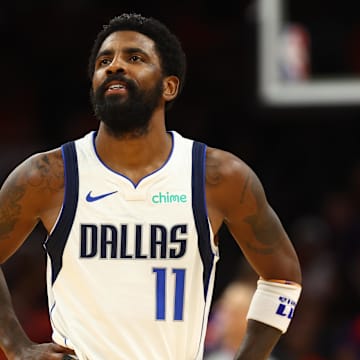 Oct 26, 2024; Phoenix, Arizona, USA; Dallas Mavericks guard Kyrie Irving (11)  reacts against the Phoenix Suns in the second half at Footprint Center. Mandatory Credit: Mark J. Rebilas-Imagn Images
